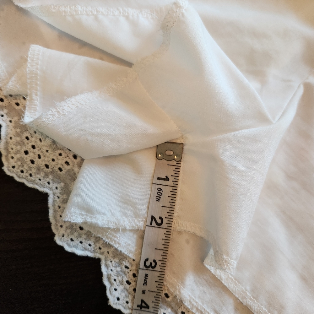 White Eyelet Sleeveless Sun Dress With Built In Shorts And Pockets - Picture 11 of 11